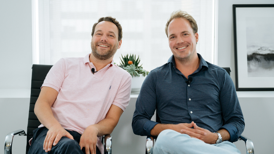 PositivePsychology.com co-founders Hugo Alberts and Seph Fontane Pennock during their exit interview after selling their edtech business.