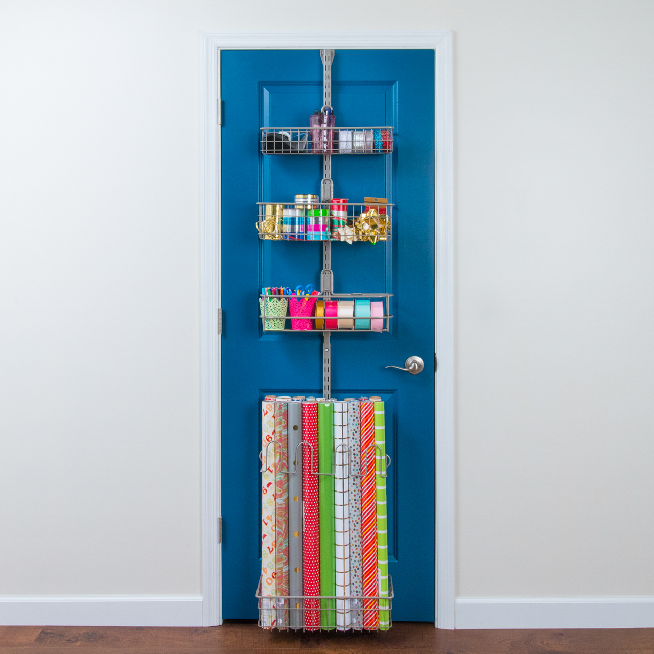 Over the Door Gift Wrap Kit storage holding wrapping paper, bows, scissors, and more.