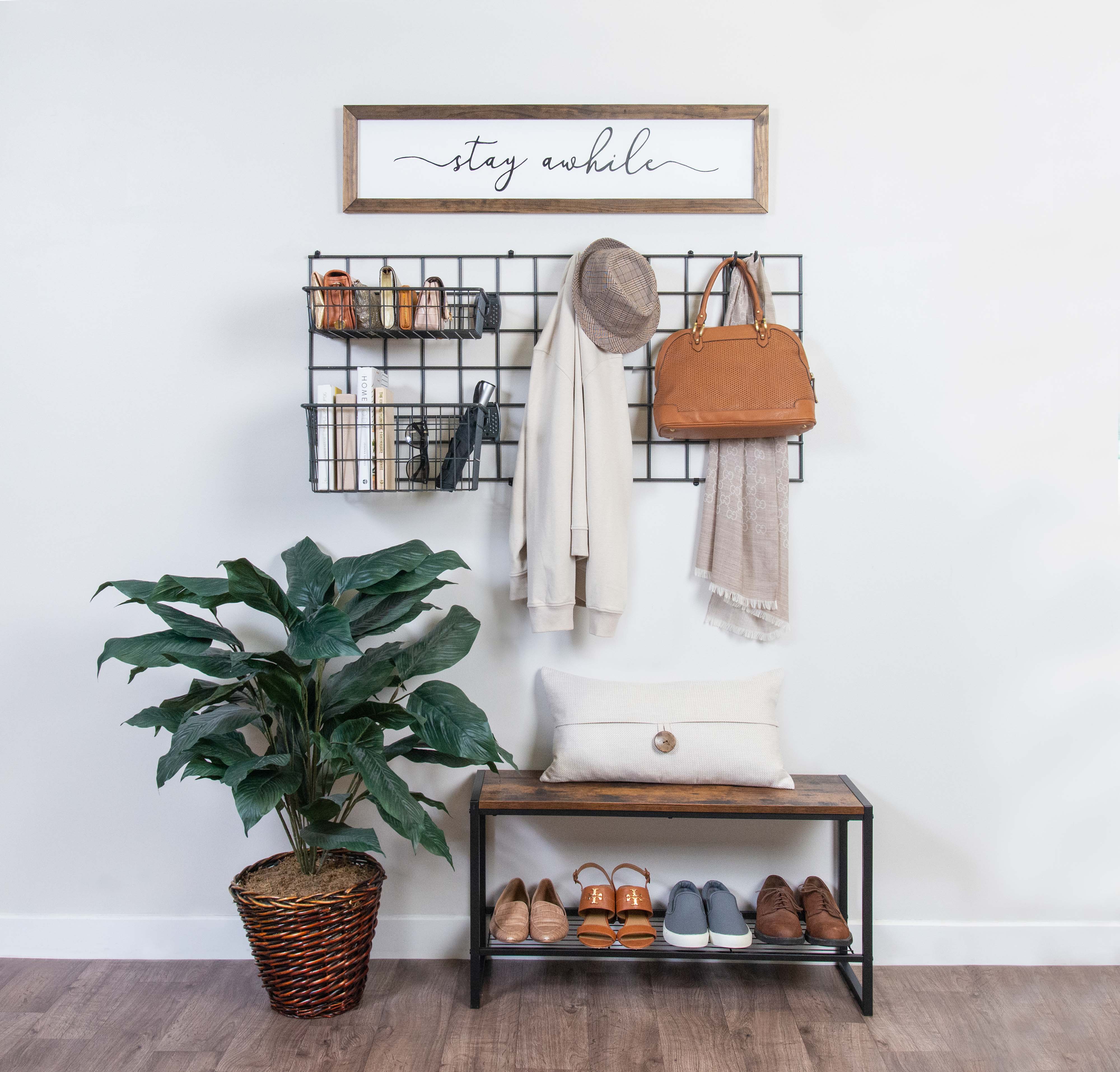 Activity Organizer Entryway with house plant, shoes, and accessories. 