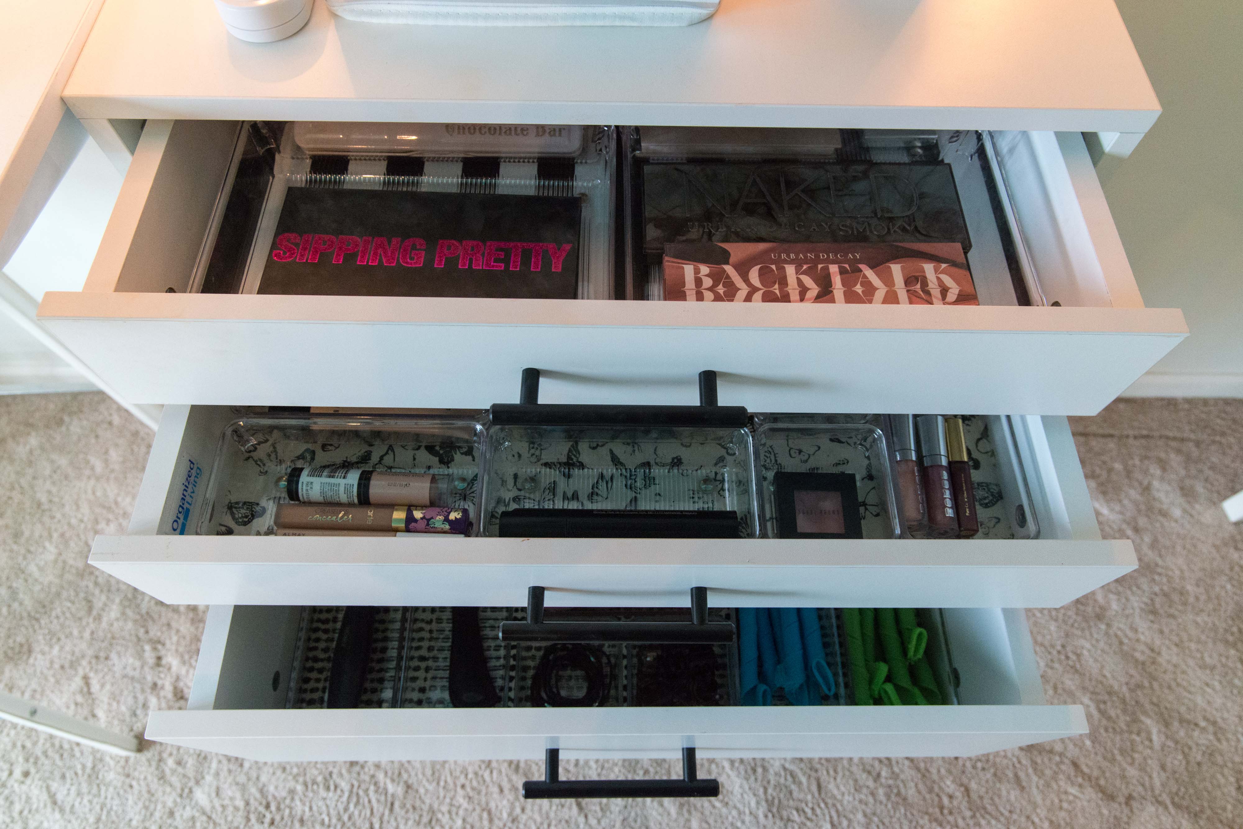 freedomRail Built-in Closet in White with make up and acrylic organizers.