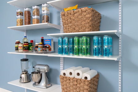 freedomRail Built-in Pantry in White with baskets and clear containers.