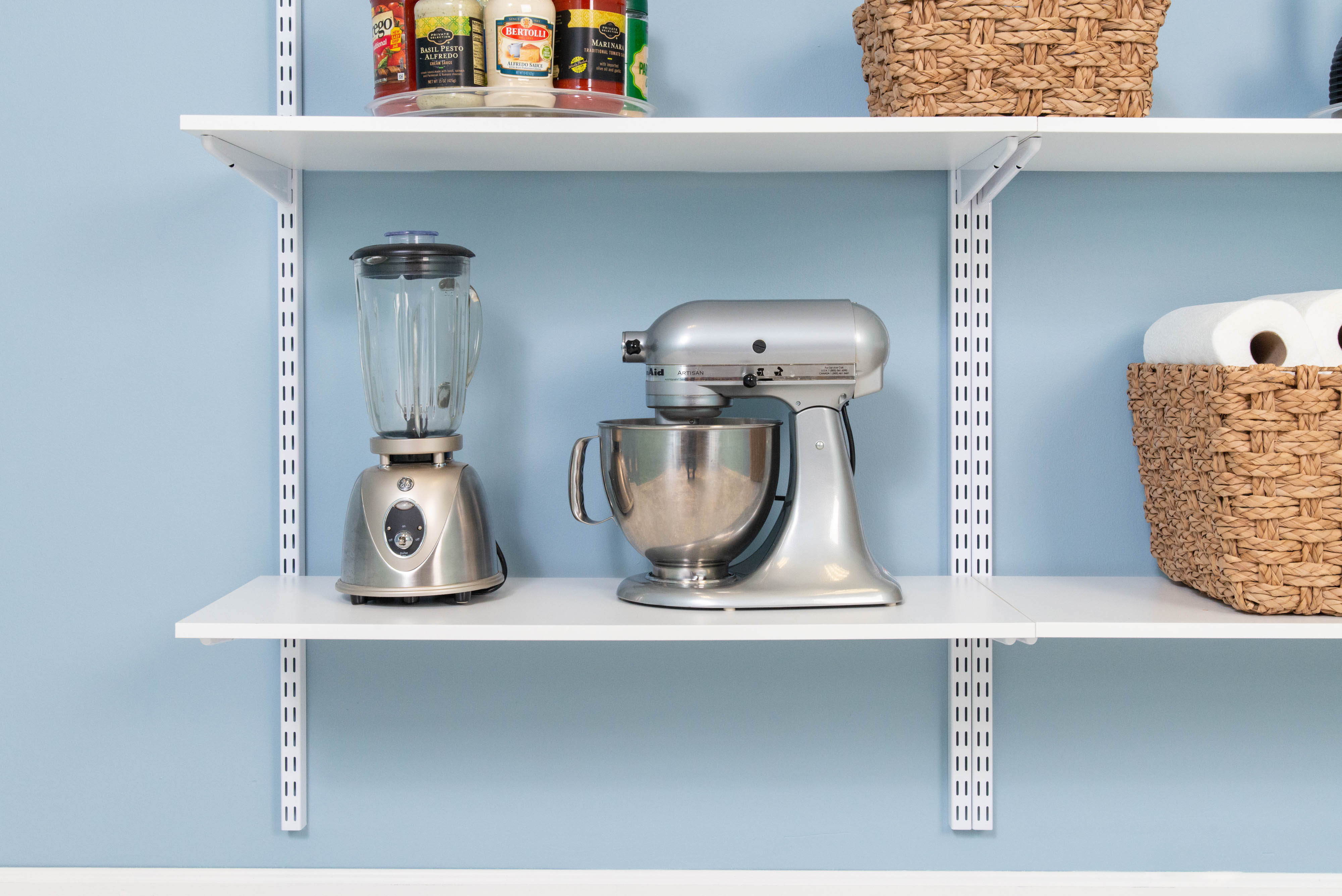 freedomRail Pantry in White with a blender and stand mixer on shelf.