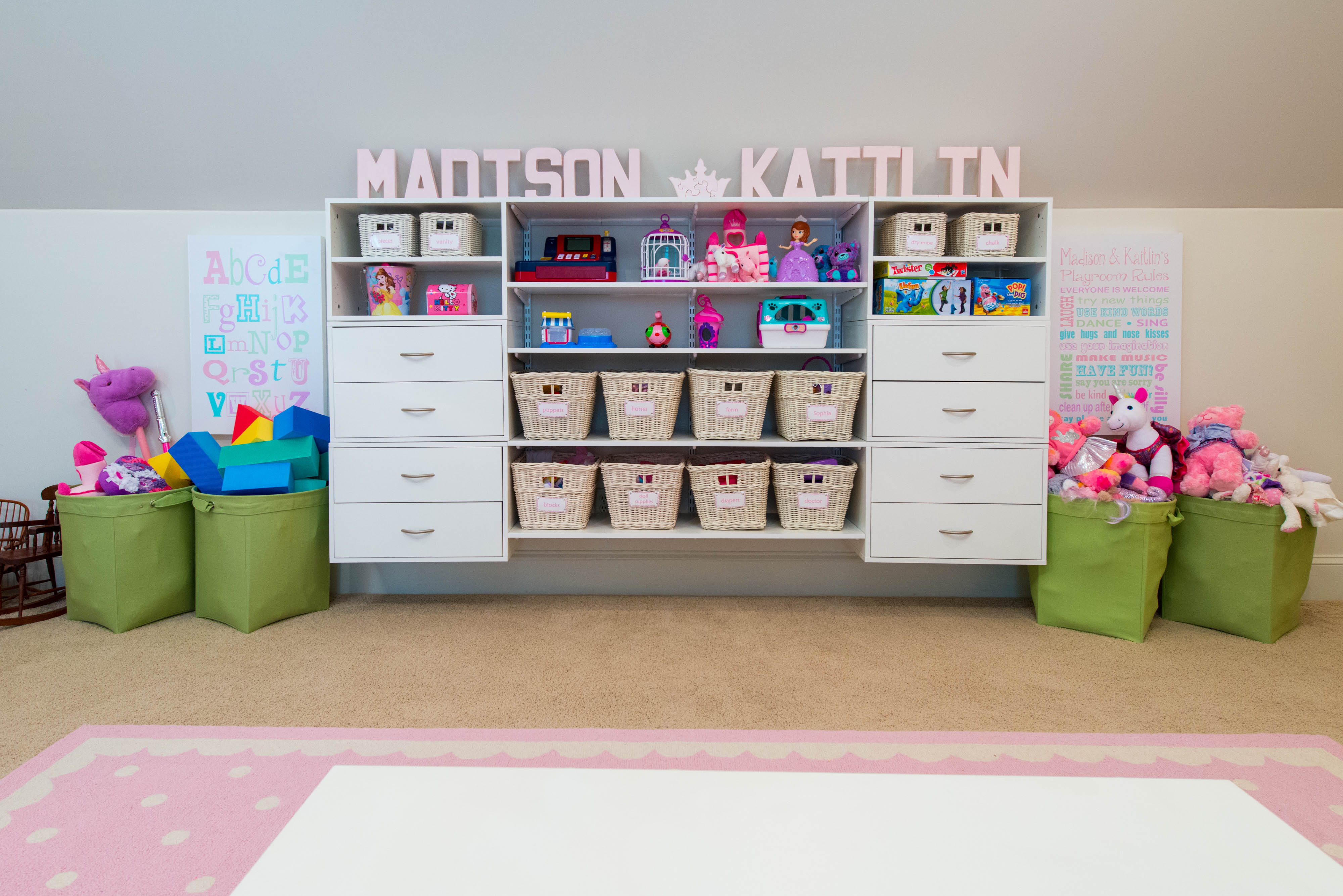 freedomRail Playroom in White with baskets and kid's names.