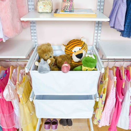 freedomRail Reach-in closet in White with child's clothes and toys.