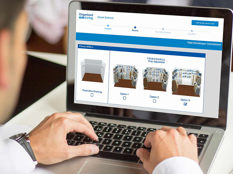 Man on laptop using closet selector software