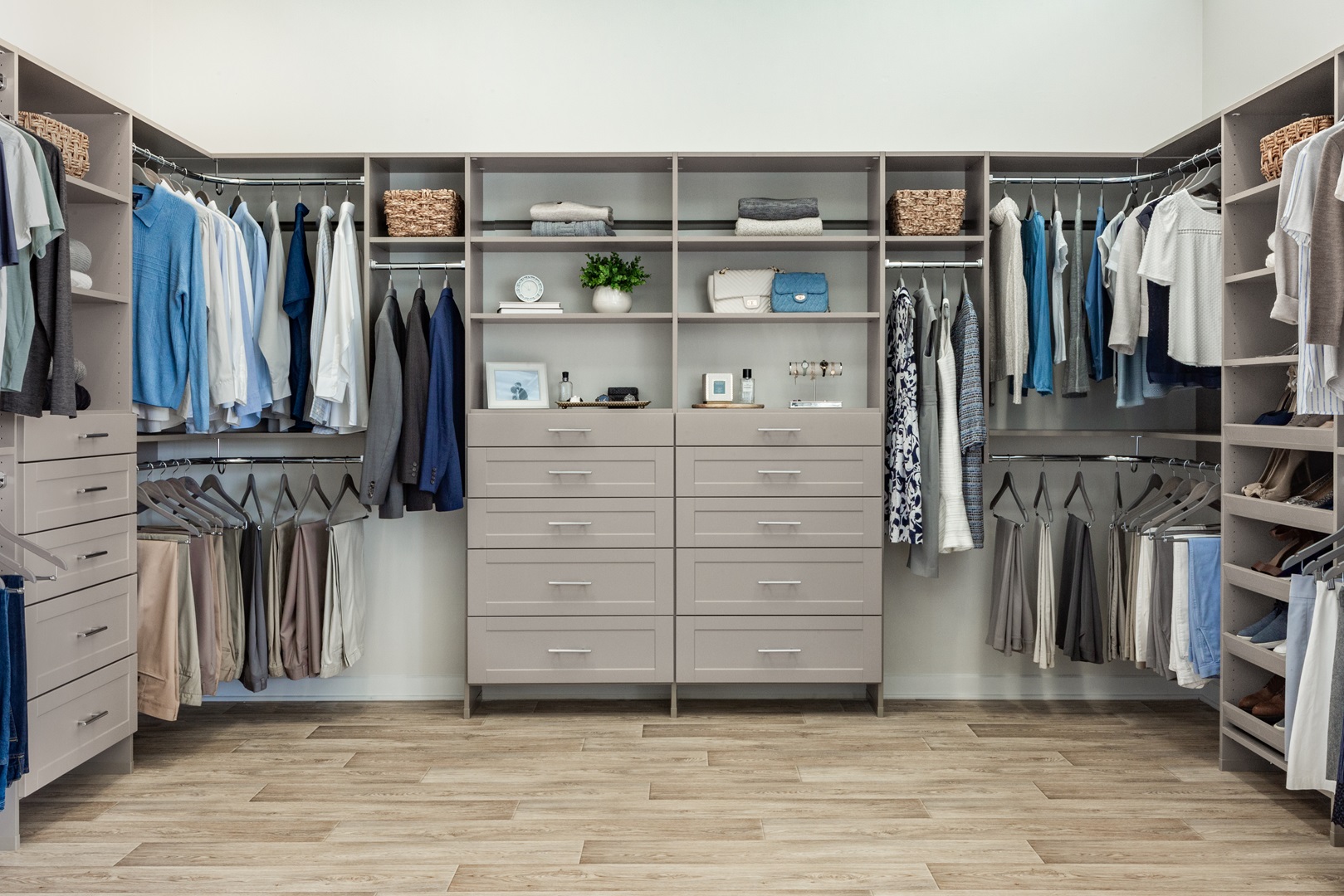 Classica bedroom walk-in closet in century gray propped with clothing, shoes and accessories.